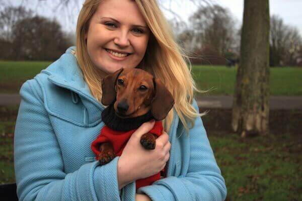 George the Dachshund with his borrower. BorrowMyDoggy can help socialise anxious dogs like George.
